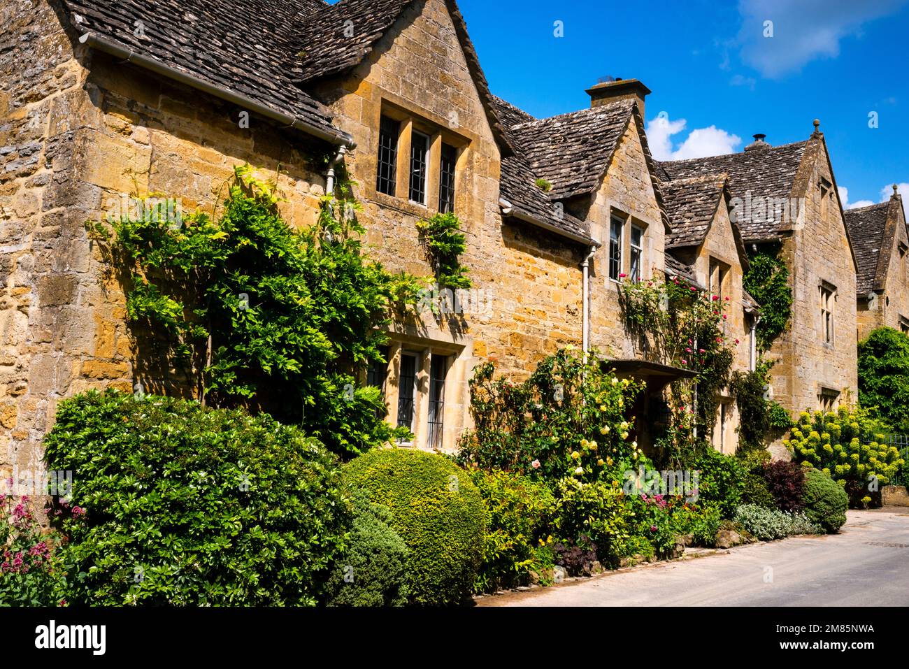 Stone terrace houses in the Cotswold Village of Stanton, England Stock