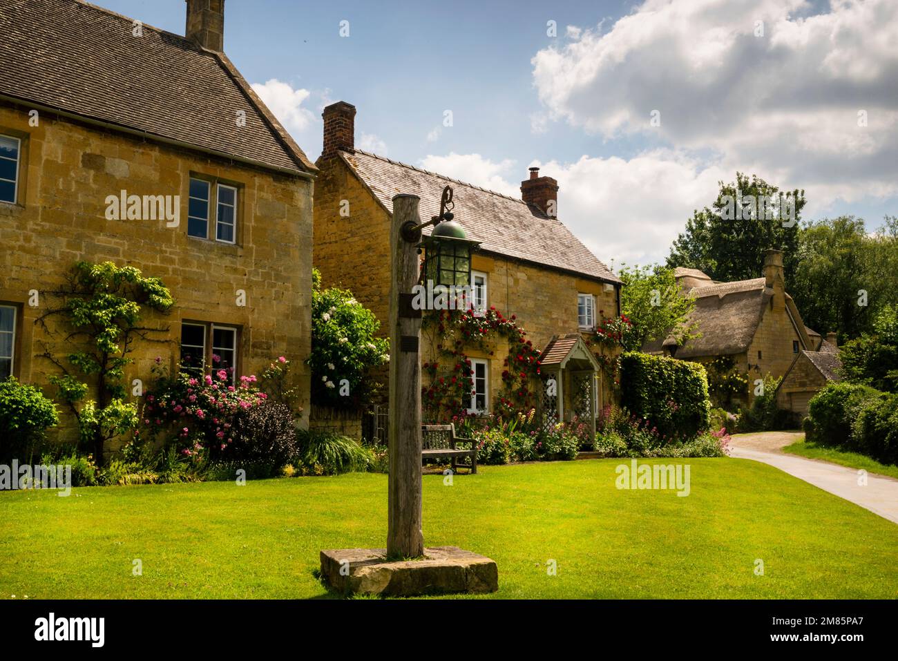 Thatch roof cottage along the Cotswold Way in the village of Stanton