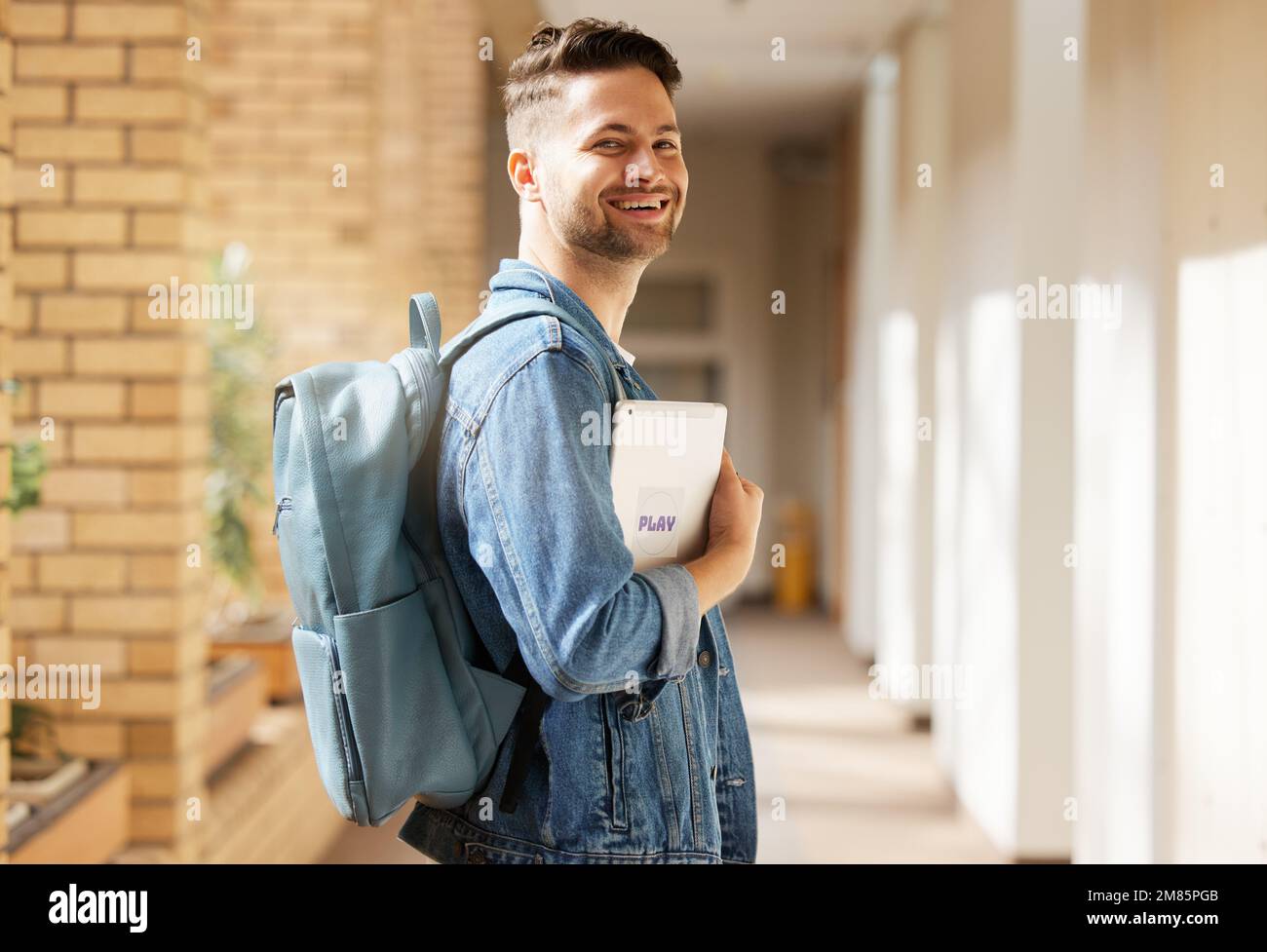 College education and student portrait with tablet for academic learning, research and studying online. Study, knowledge and Gen Z university man at Stock Photo