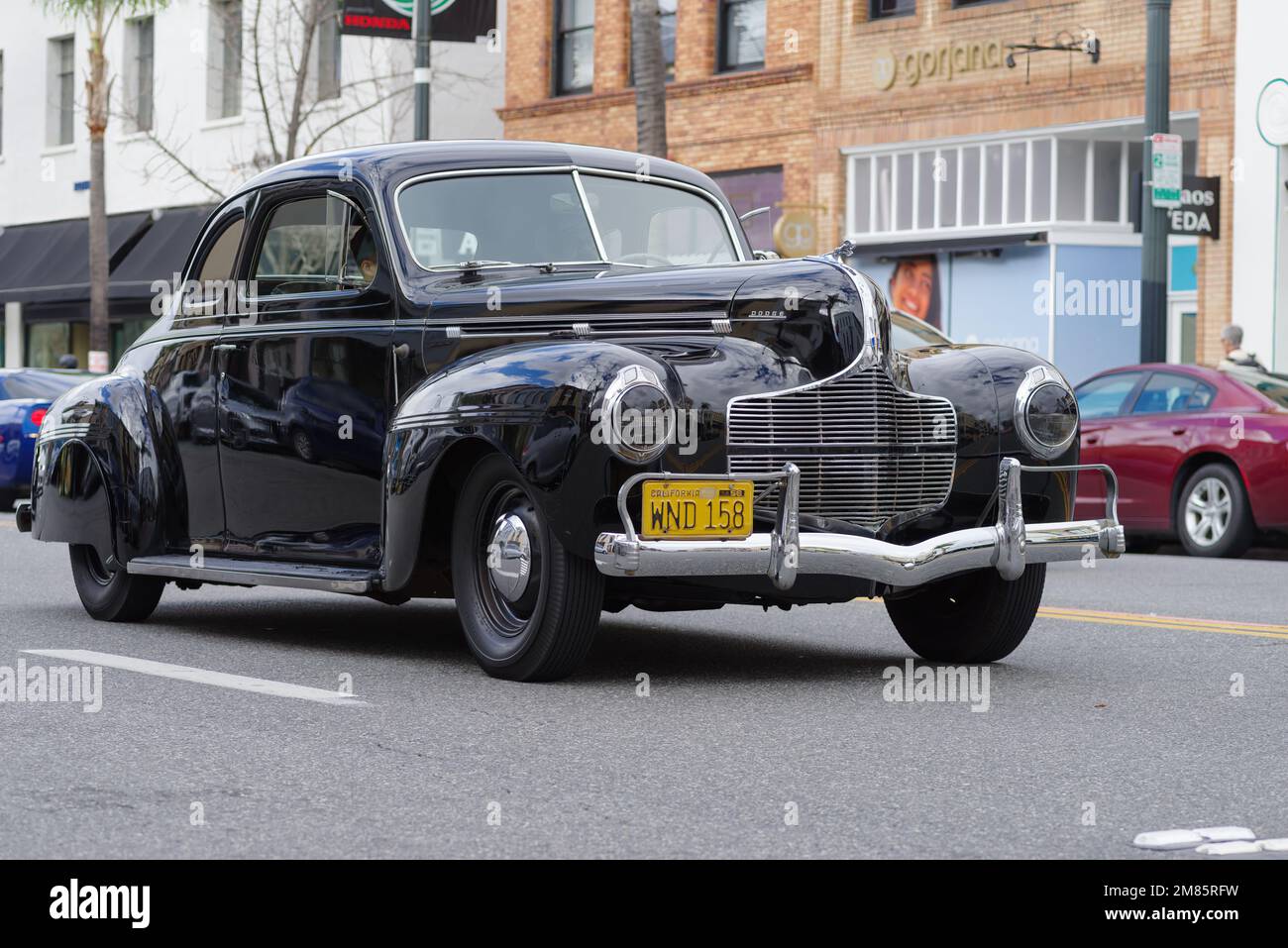 Pasadena, California, United States - January 1, 2023: 40's Dodge vintage car shown on Colorado Boulevard in the City of Pasadena on New Year's Day. Stock Photo