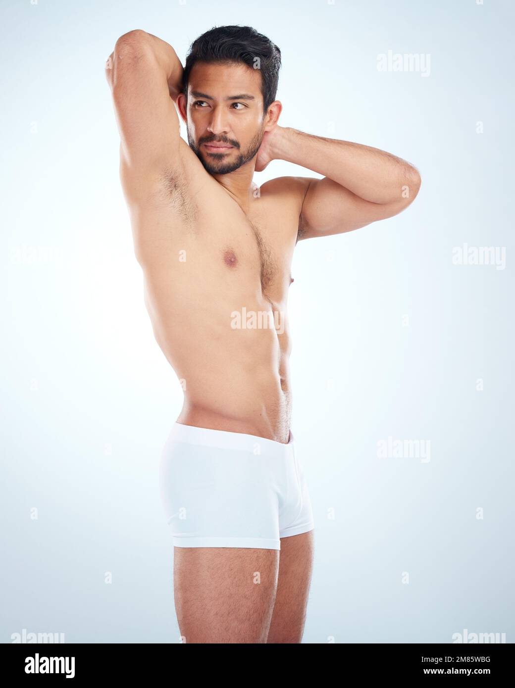 Asian man exercising in his underwear Stock Photo - Alamy