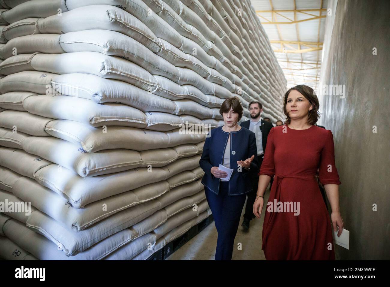 Adama, Ethiopia. 12th Jan, 2023. Annalena Baerbock (r, Bündnis90/Die Grünen), foreign minister, visits a United Nations World Food Programme (WFP) grain warehouse together with French Foreign Minister Catherine Colonna Baerbock. The Ethiopian government had reached a peace agreement with the Tigray People's Liberation Front (TPLF) in November. Credit: Michael Kappeler/dpa/Alamy Live News Stock Photo