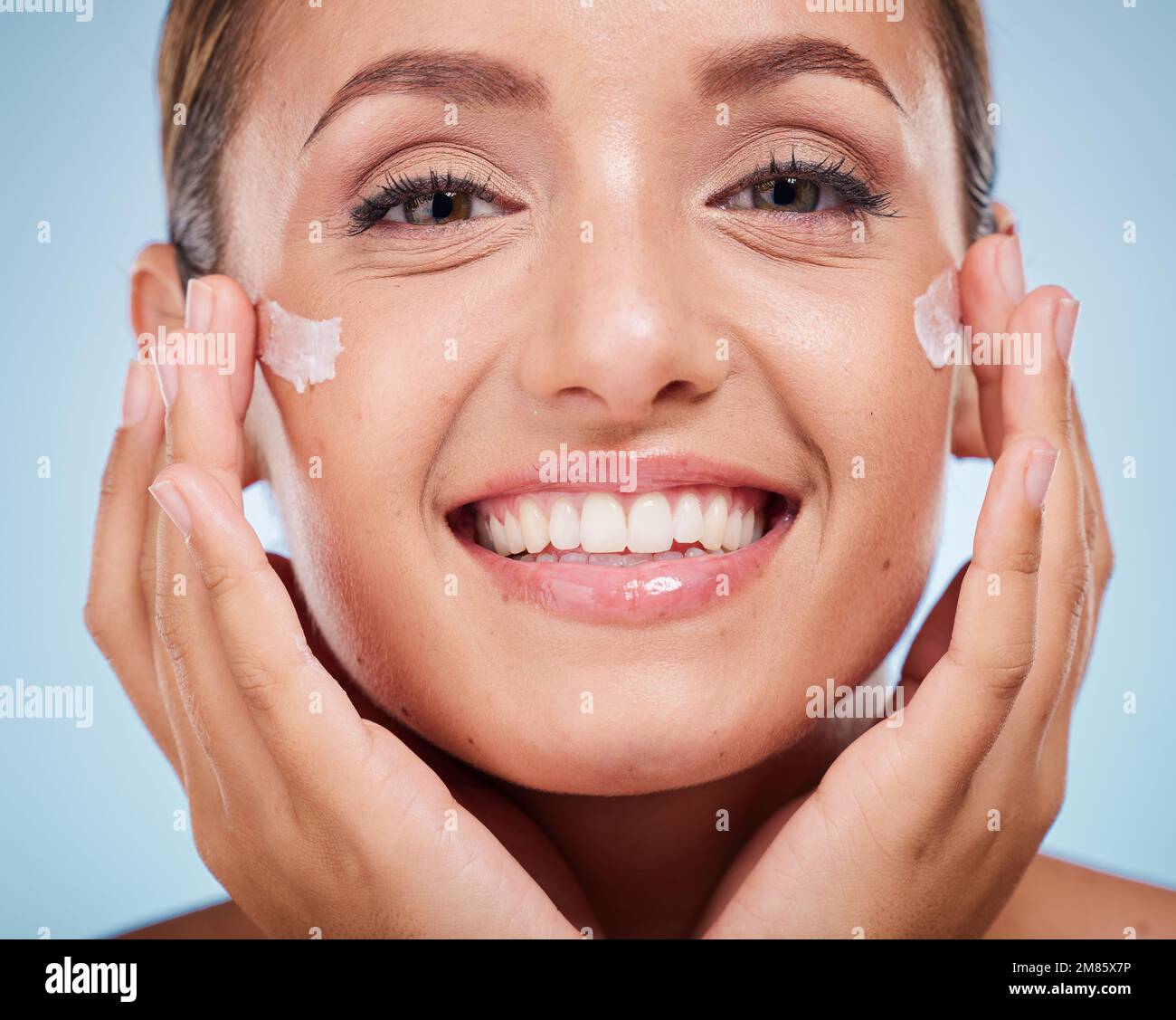 Beauty, face and cream with skincare and woman with hands frame, glow