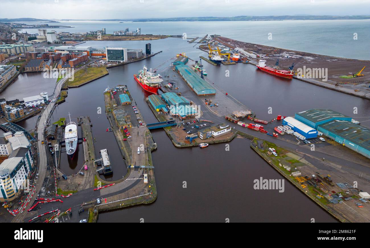 Edinburgh, Scotland, UK. 12 January 2023. Aerial views of Forth Ports docks in Leith, Edinburgh. The Forth Green Freeport is expected to be named by PM Rishi Sunak today as one of two successful bidders for Freeport status along with Cromarty Freeport. The Prime Minister is flying to Scotland today to meet First Minister, Nicola Sturgeon.  Iain Masterton/Alamy Live News Stock Photo
