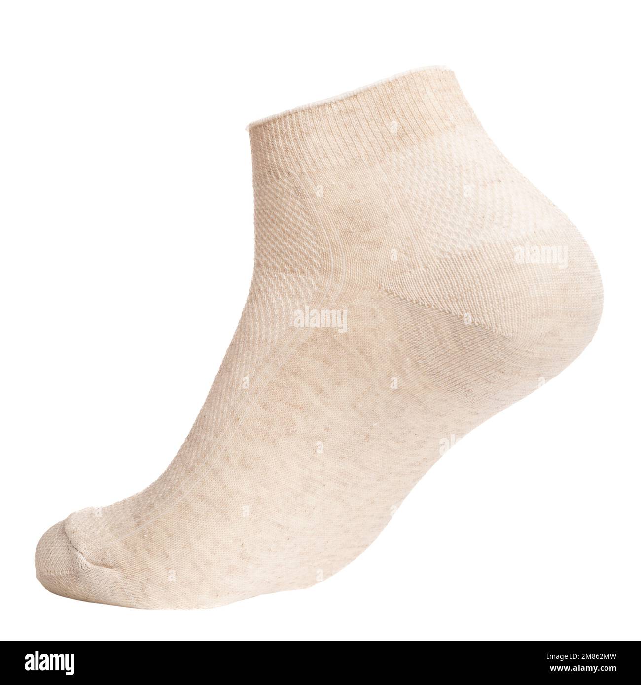 Beige cotton-blend low cut ankle sock on foot mannequin isolated on a white background Stock Photo