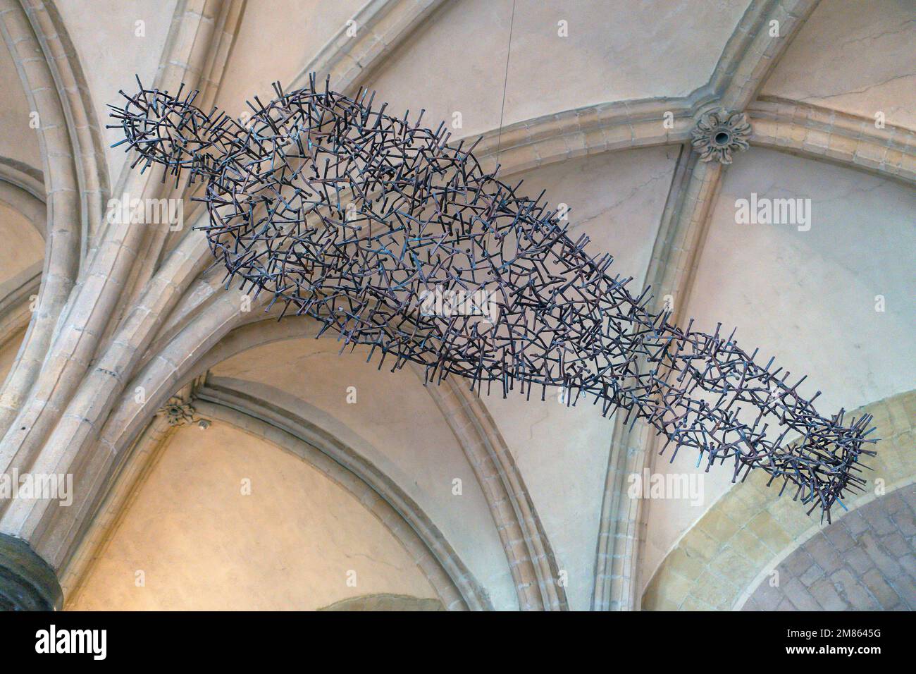 Transport by Antony Gormley. Transport is a sculpture by Antony Gormley in the crypt of Canterbury Cathedral in Kent. Installed in 2011. It's made fro Stock Photo