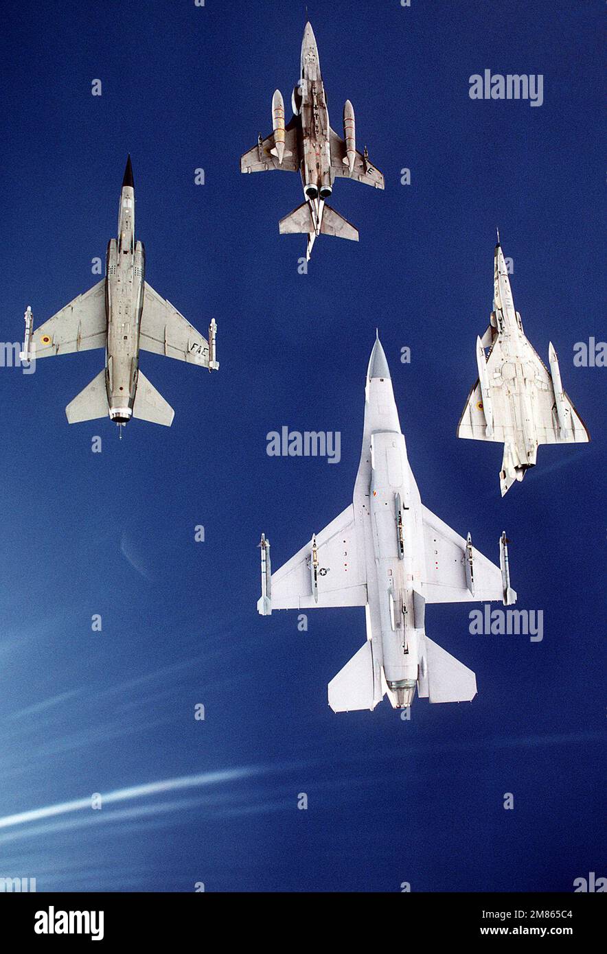 An underside view of four aircraft from the Ecuadoran and U.S. air ...