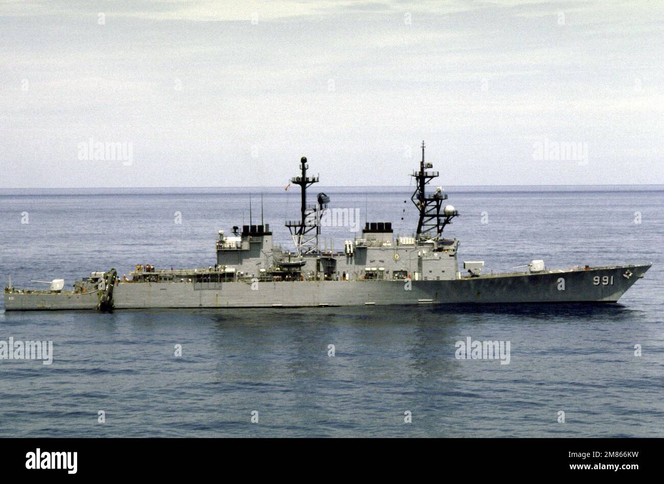 A starboard beam view of the destroyer USS FIFE (DD991) with a