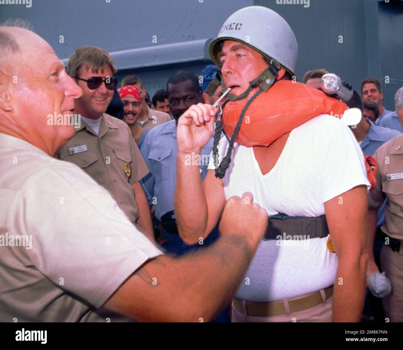 Crew members aboard the battleship USS MISSOURI (BB63) participate in