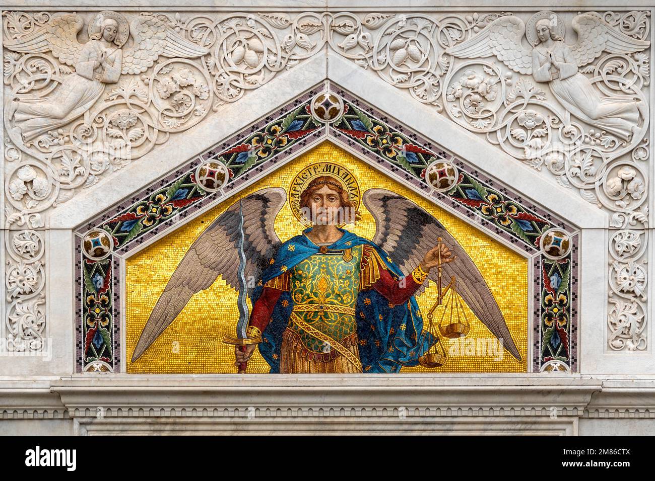 Mosaic of the Archangel Michael on the northern entrance of the Church of Saint Spyridon, Trieste, Italy Stock Photo