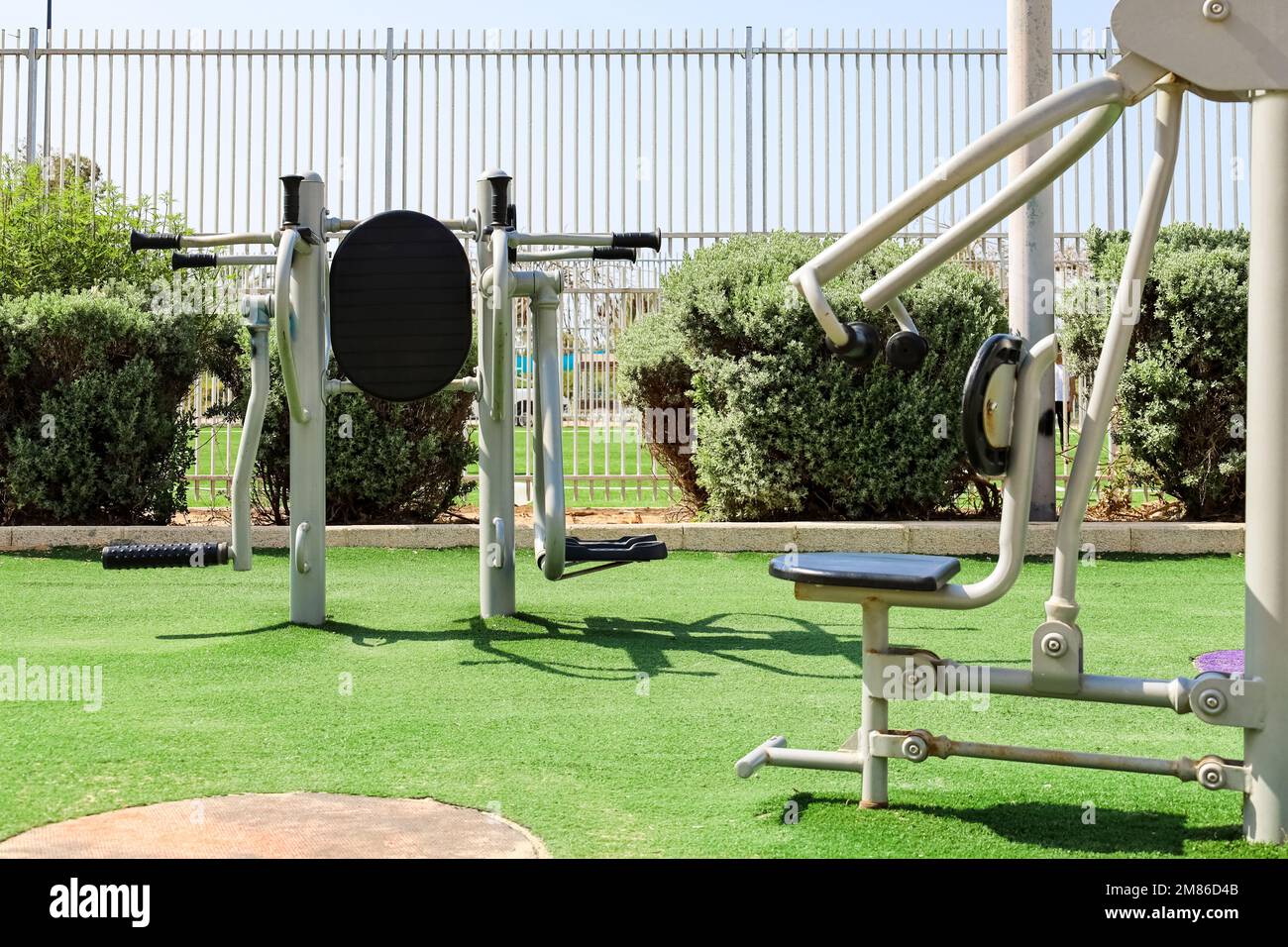 Modern exercise equipment on sport ground Stock Photo Alamy