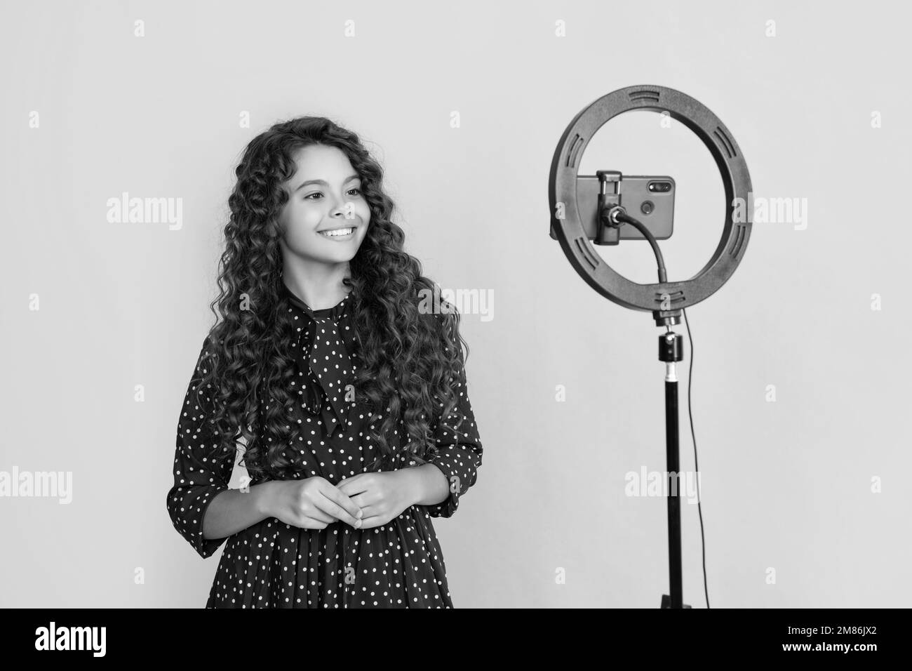 Cheerful girl long curly Black and White Stock Photos & Images - Alamy