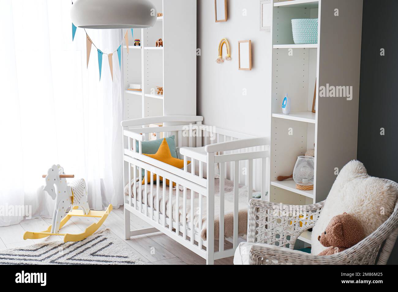 Stylish interior of children's room with baby bed Stock Photo Alamy