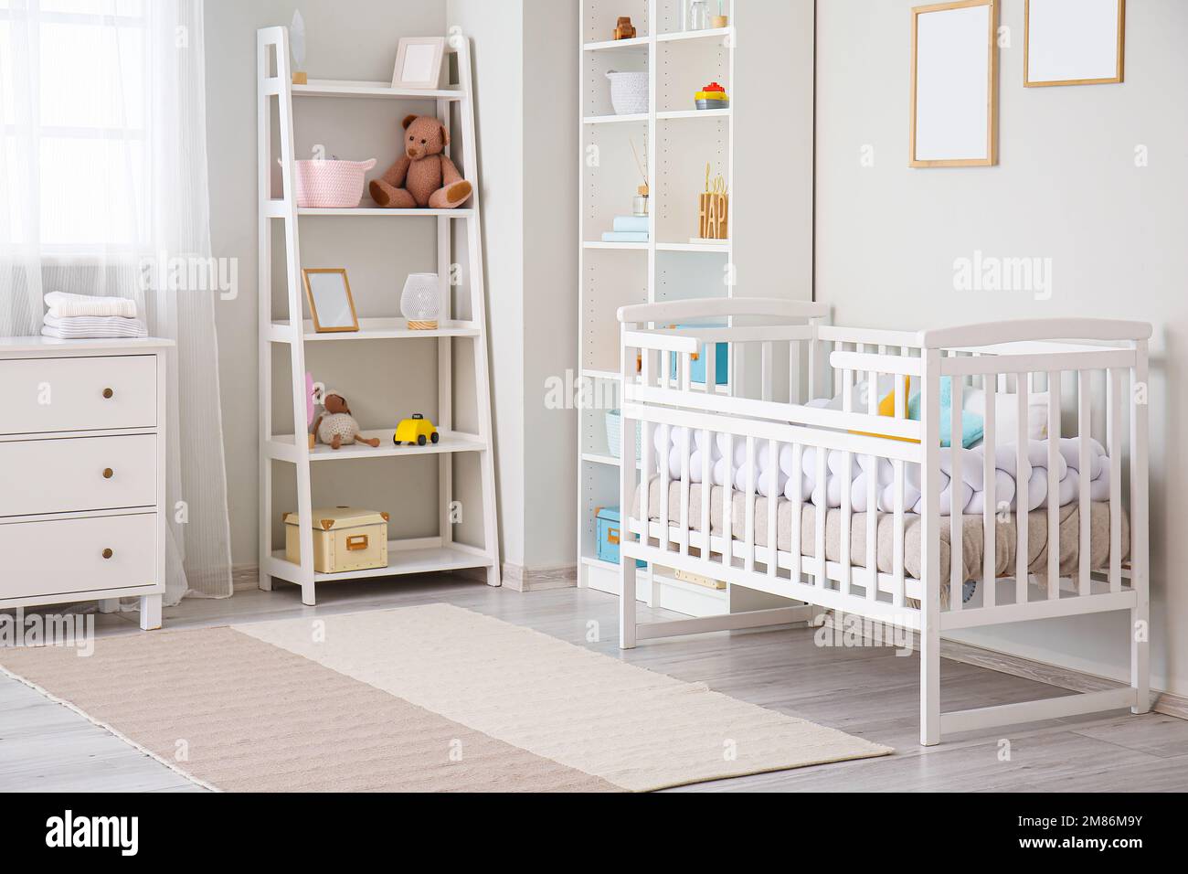 Stylish interior of children's room with baby bed Stock Photo Alamy