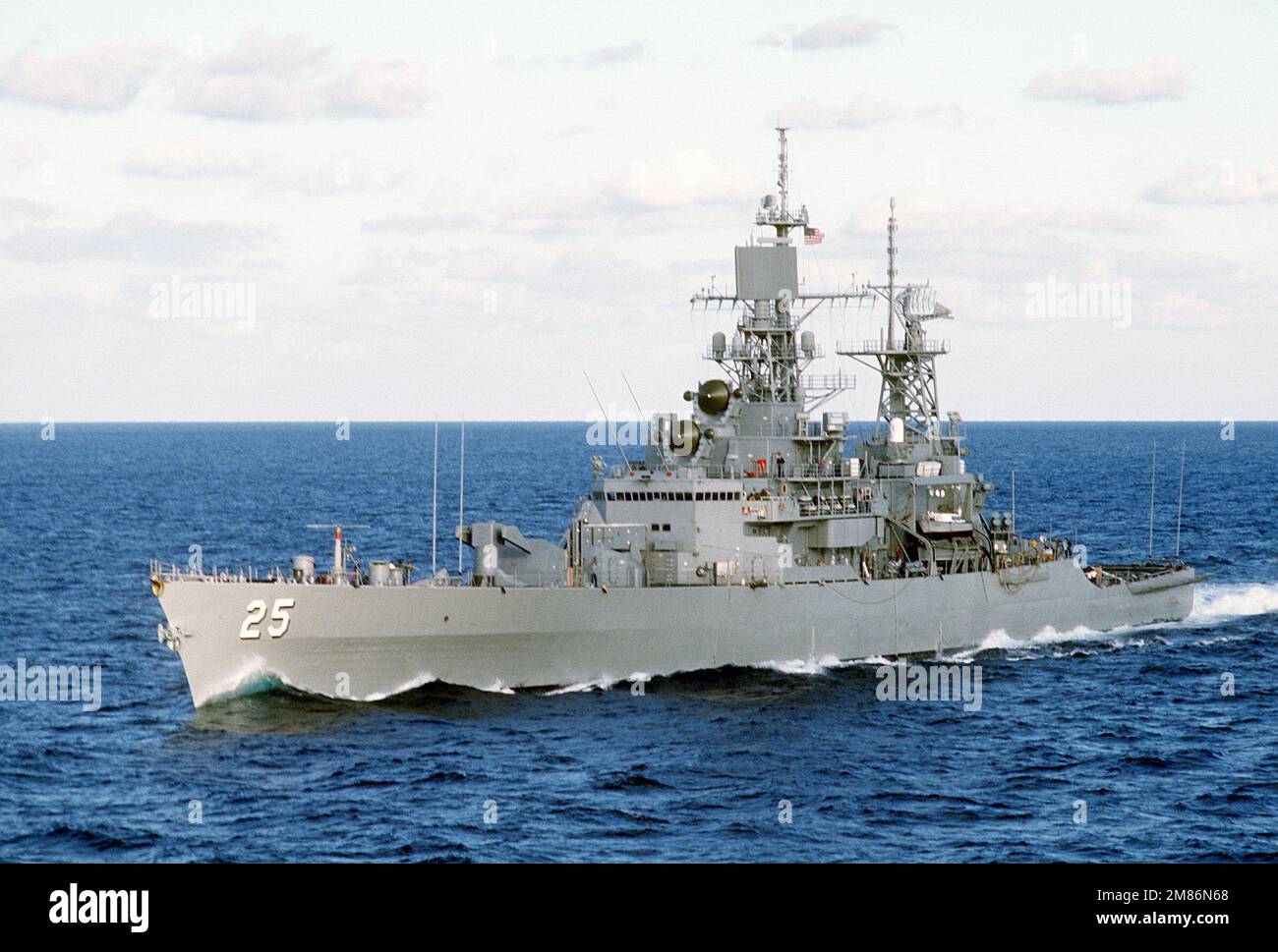 A port bow view of the nuclear-powered guided missile cruiser USS ...