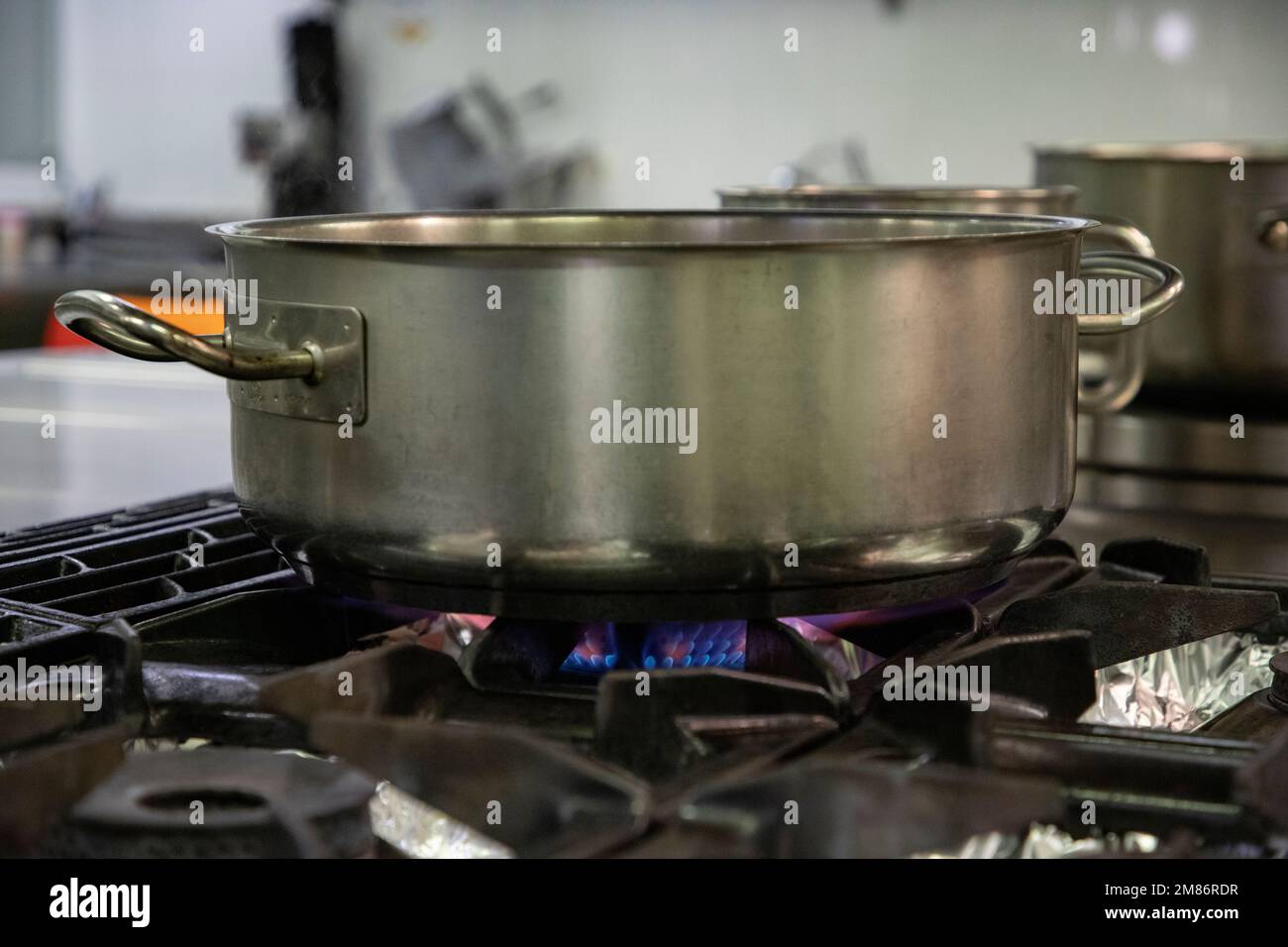 Stoves. Kitchen room. Gas stove with burning propane gas flames. Concept of industrial resources