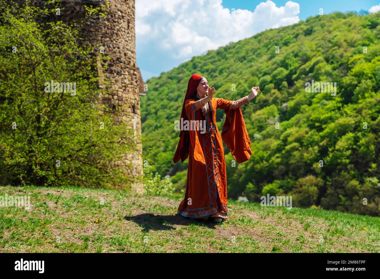 georgian-girl-in-national-costume-dances-georgian-national-dances-selective-focuspeople-2M86TPF.jpg