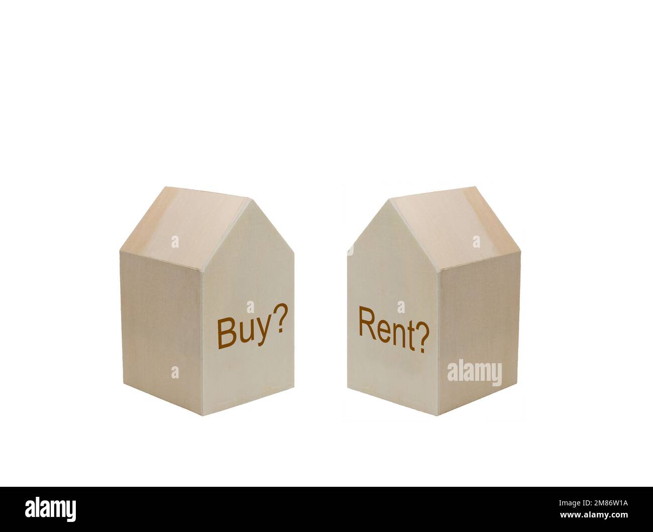 Pair of model houses with words Buy? and Rent? on the walls. Housing market options concept. Stock Photo