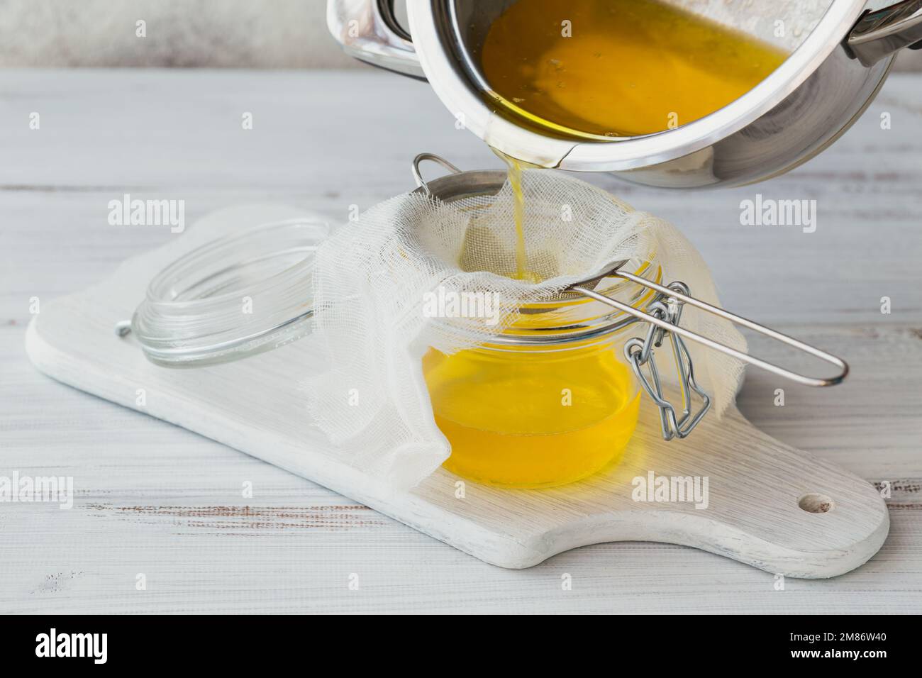 Preparation of Ghee or a clarified butter. Healthy fat diet concept