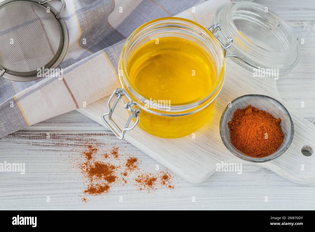 Preparation of Ghee or a clarified butter. Healthy fat diet concept Stock Photo Alamy
