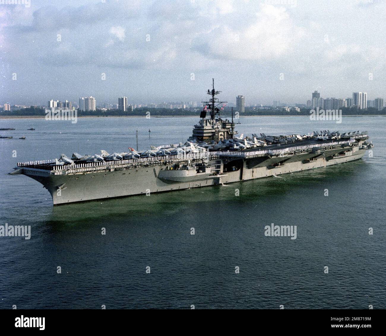 Crew members man the rails as the aircraft carrier USS RANGER (CV-61 ...
