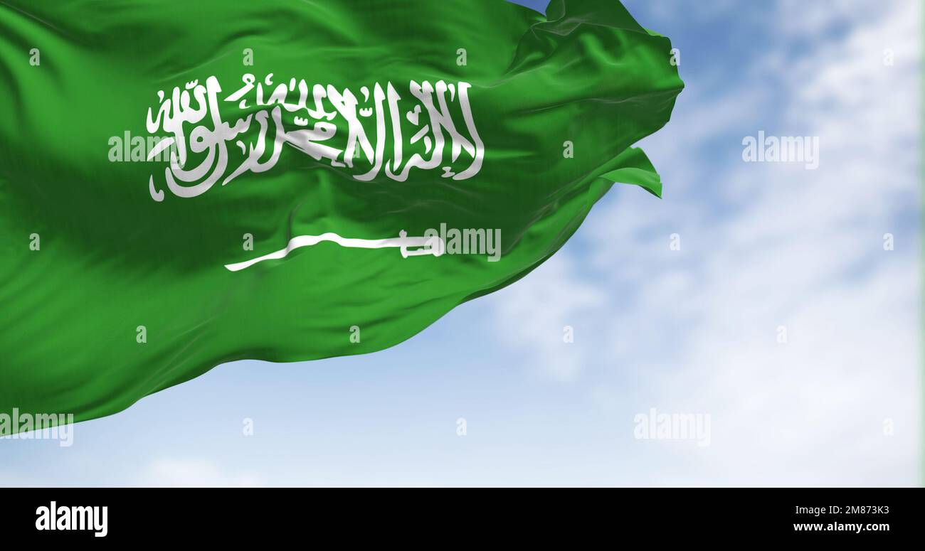 Saudi Arabia national flag waving in the wind on a clear day. Green field with Shahada and sword in Thuluth script. Rippled fabric. Realistic 3d illus Stock Photo