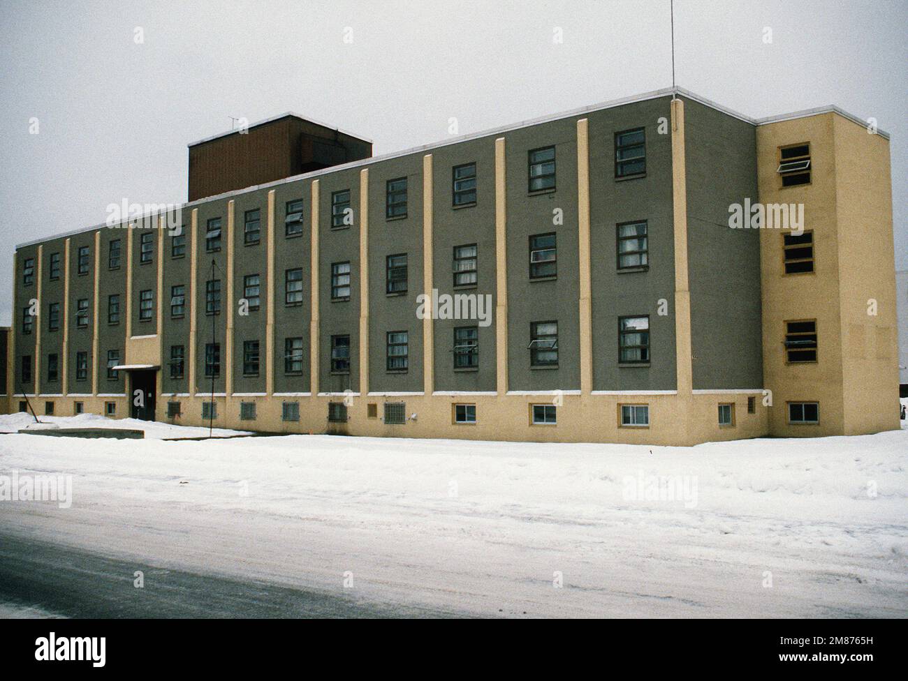 Exterior view of a U.S. Army barracks building. Base: Fort Richardson State: Alaska (AK) Country: United States Of America (USA) Stock Photo