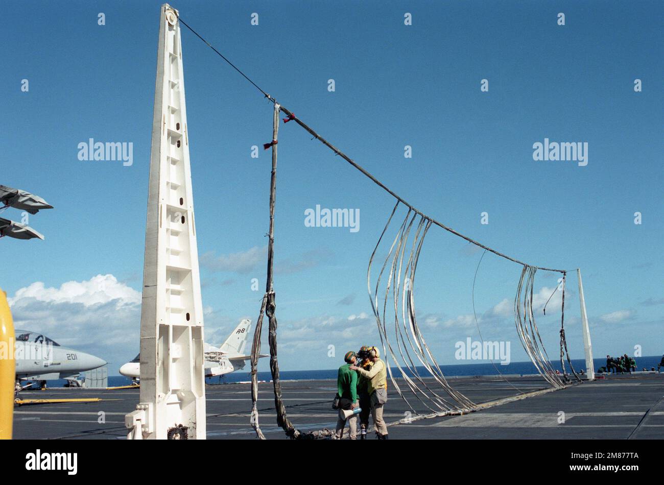The crash barricade is raised on the flight deck of the nuclearpowered