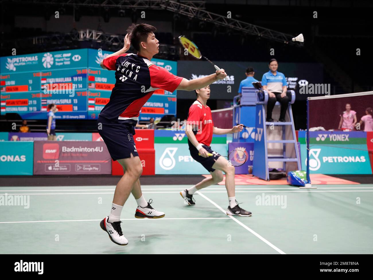 Kuala Lumpur, Malaysia. 12th Jan, 2023. Liu You Chen (L) and Ou Xuan Yi of China play against Aaron Chia and Son Wooi Yik of Malaysia during the Men's Doubles second round match of the Petronas Malaysia Open 2023 at Axiata Arena.Satwiksairaj Rankireddy (R) and Chirag Shetty of India won with scores; 21/22 : 19/20 Credit: SOPA Images Limited/Alamy Live News Stock Photo