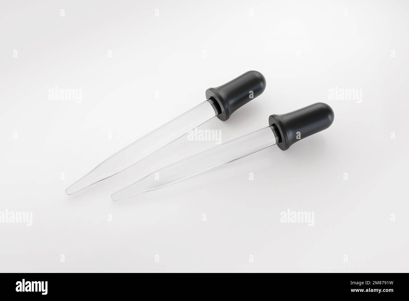 A couple of eye droppers isolated on white background. Illustration of the concept of scientific