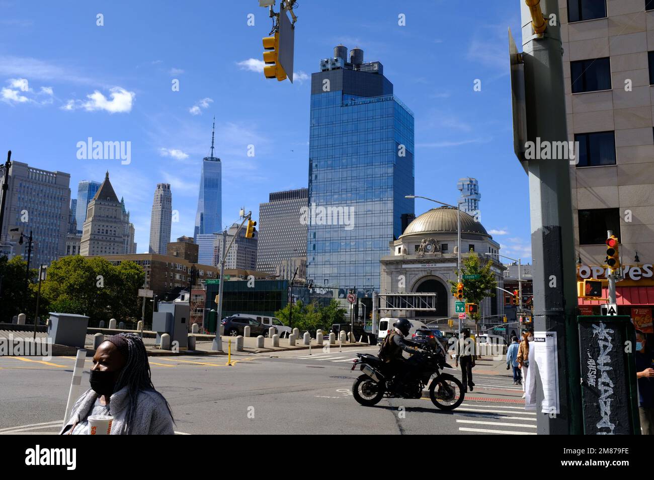 Canal street and Bowery street intersection with the domed HSBC Bank building, Hotel 50 Bowery and One World Trade Center and other buildings in Lower Manhattan in the background.New York City.USA Stock Photo