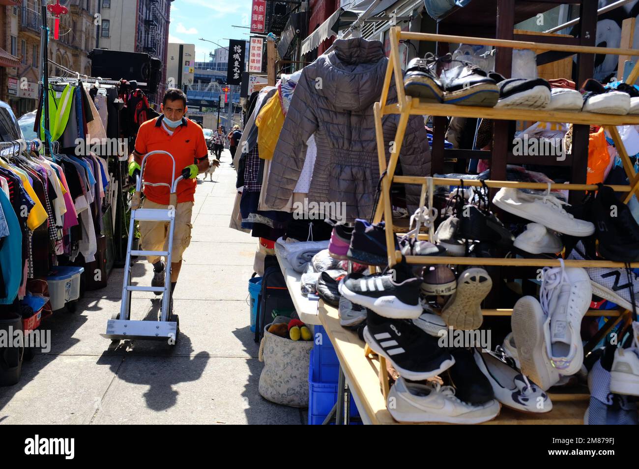 Shoes for sale in chinatown hi-res stock photography and images - Alamy