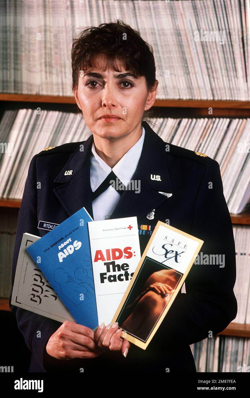 MAJ. Betty Richley-Nelms, officer in charge of environmental medicine at Wilford Hall Medical Center, displays information pamphlets about acquired immune deficiency syndrome (AIDS). Nelms, a nurse at the center, is active in distributing accurate information about AIDS. Base: Lackland Air Force Base State: Texas (TX) Country: United States Of America (USA) Stock Photo