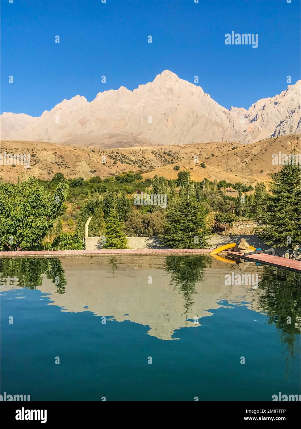 Swimming Pool and Mount Demirkazik on Aladaglar National Park in Nigde