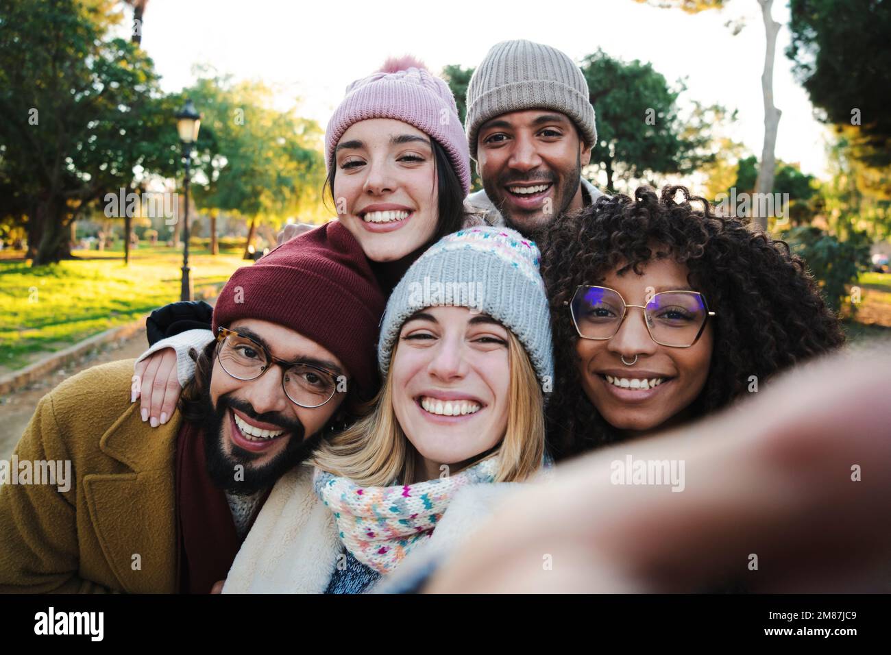 Selfie portrait of a group of multiracial young people having fun in a travel trip on vacations. Front view of cheergul friends enjoying together the weekend. High quality photo Stock Photo