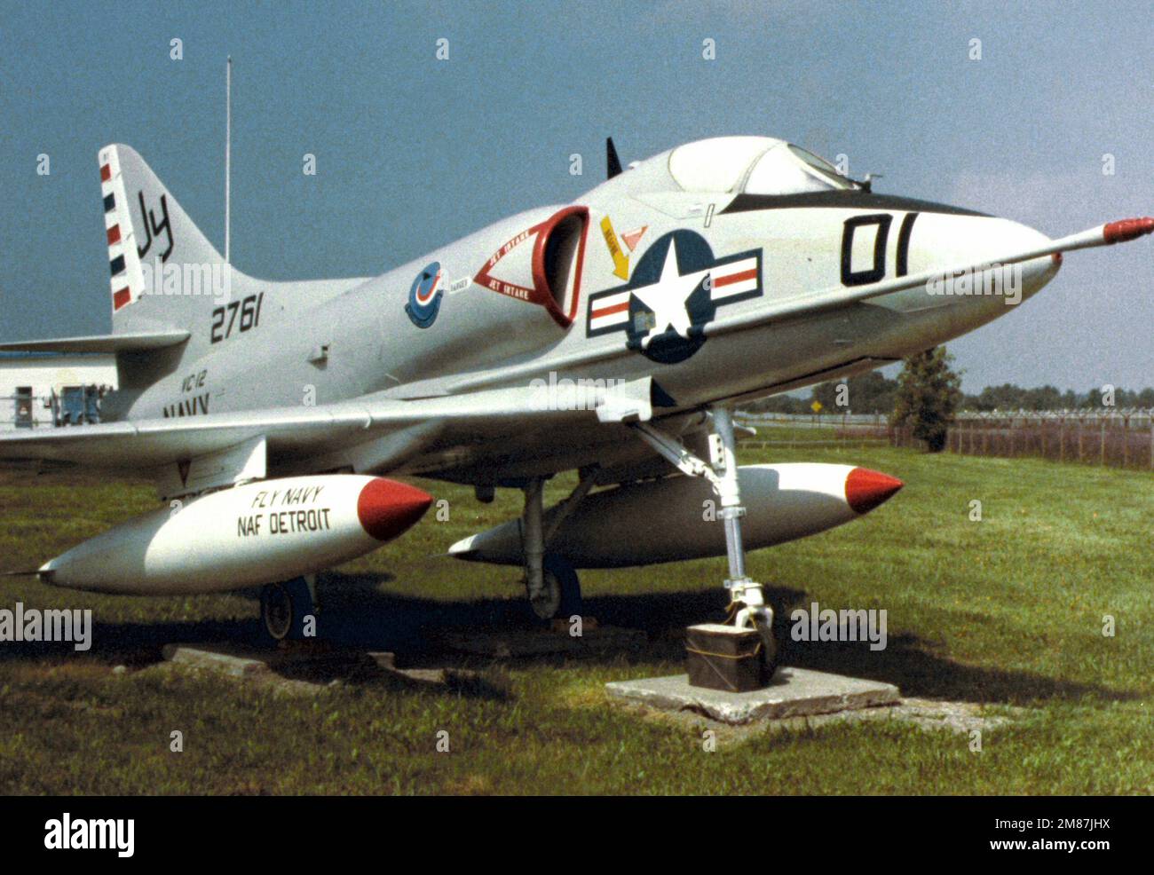 A right front view of a Fleet Composite's Squadron 12 (VC-12) A-4 Skyhawk aircraft parked in a grassy area. Base: Naval Air Station, Oceana State: Virginia (VA) Country: United States Of America (USA) Stock Photo