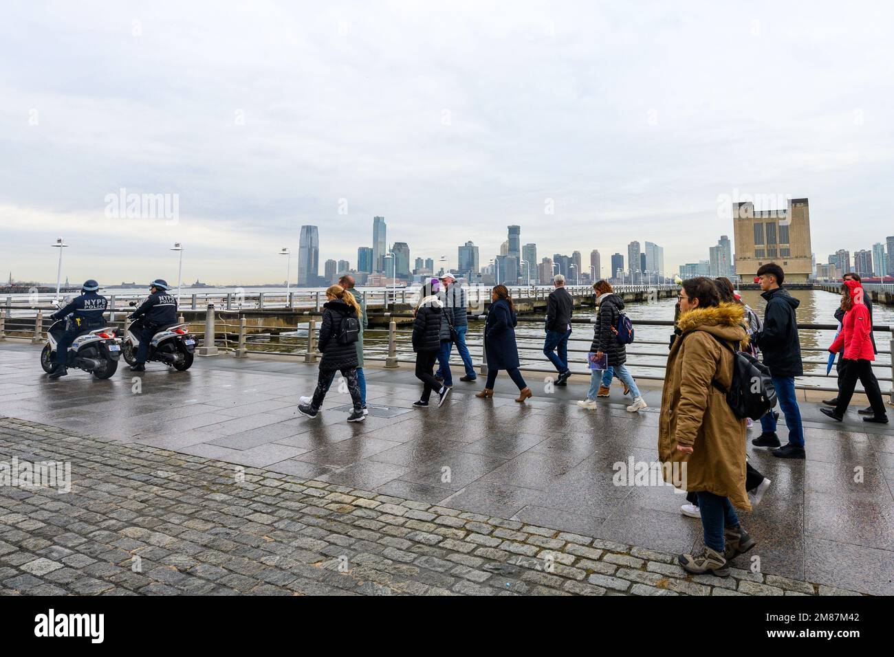 New York, USA. 12th Jan, 2023. Police escort relatives of victims and survivors of a terror attack as they visit the site in lower Manhattan where Sayfullo Saipov killed 8 people on October 31, 2017. Saipov may face the death penalty for the fatal truck rampage in a trial that started this week in a Federal Court. Credit: Enrique Shore/Alamy Live News Stock Photo