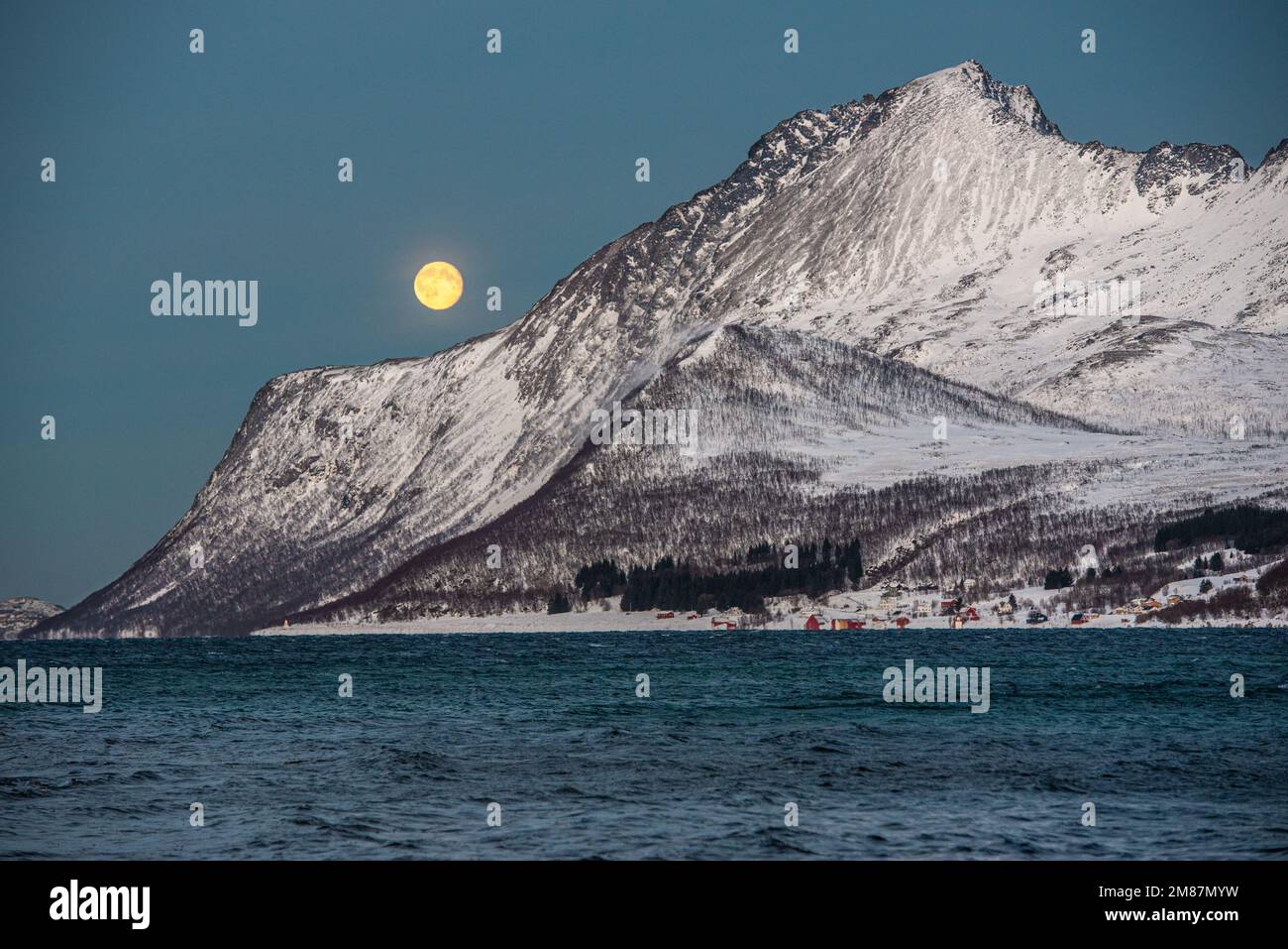 Polar night and full moon in Arctic landscape near Tromso, Norway Stock Photo
