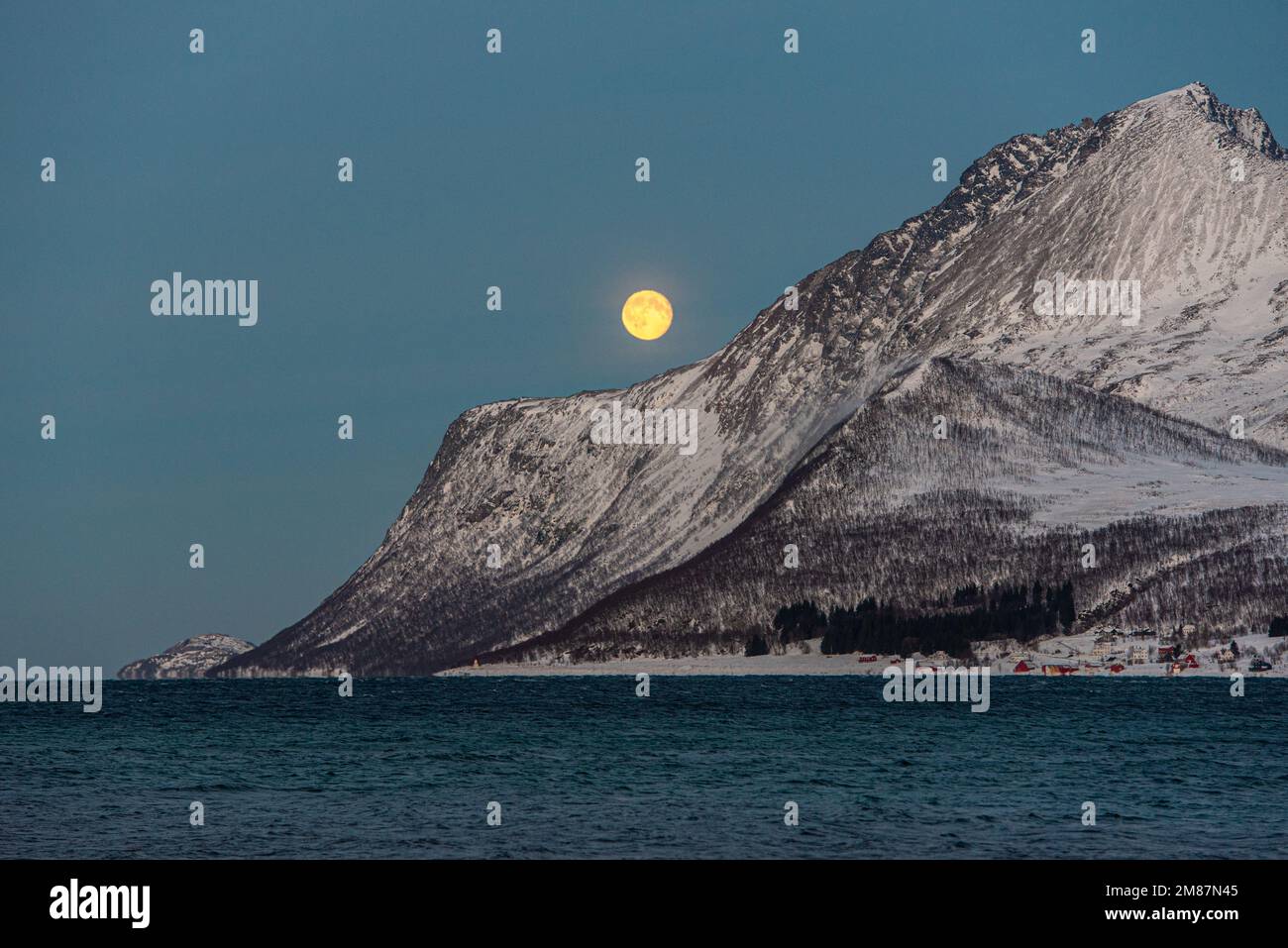 Polar night and full moon in Arctic landscape near Tromso, Norway Stock