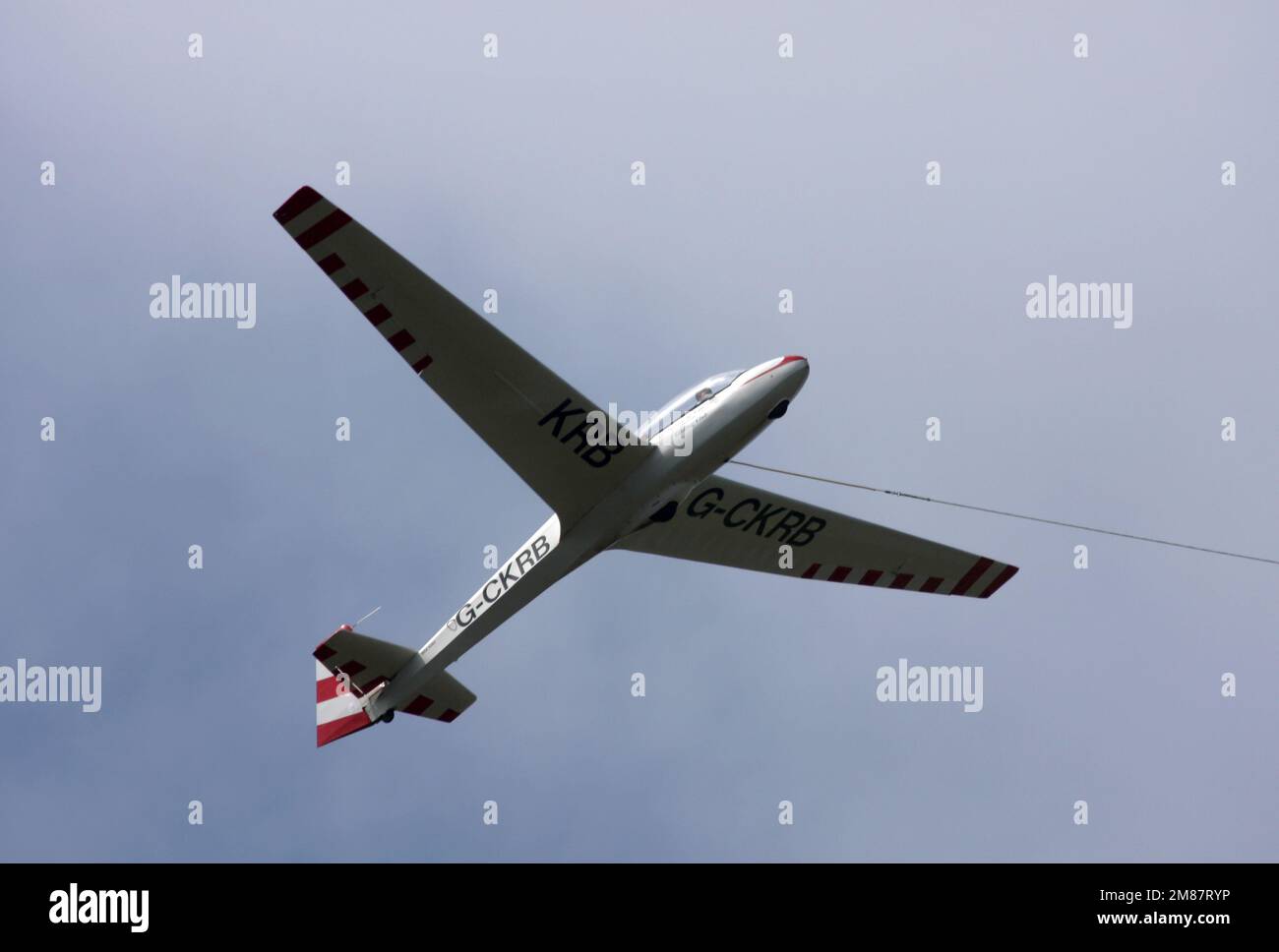 A Schleicher ASK13 glider being winch launched from Camphill Farm