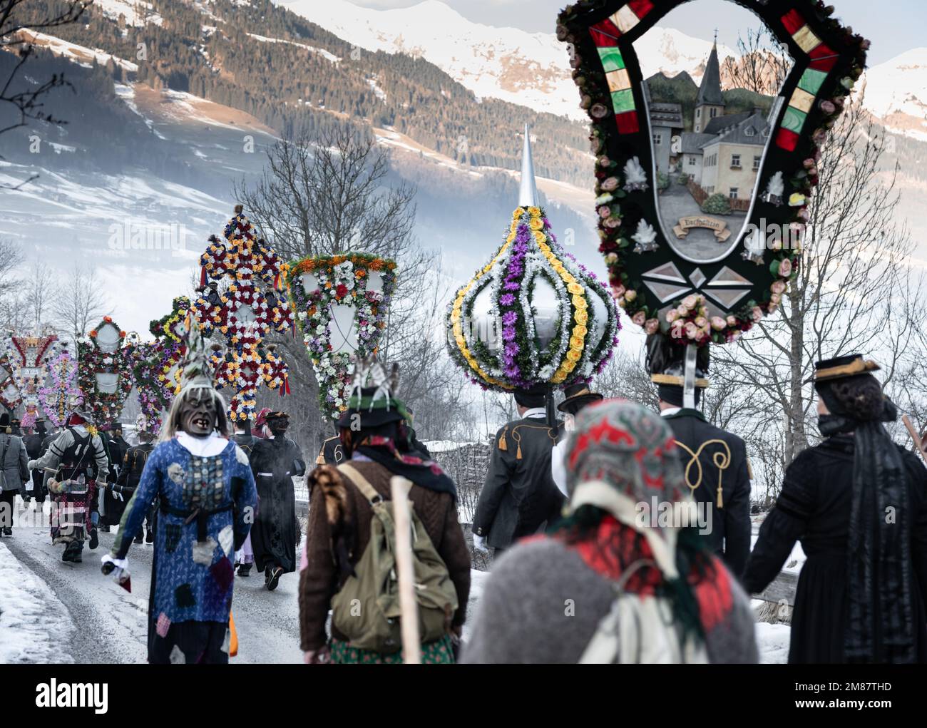 AUSTRIA, GASTEIN - January 1, 2023: movement of participants in the procession of perchts in the Austrian Gastein Valley Stock Photo