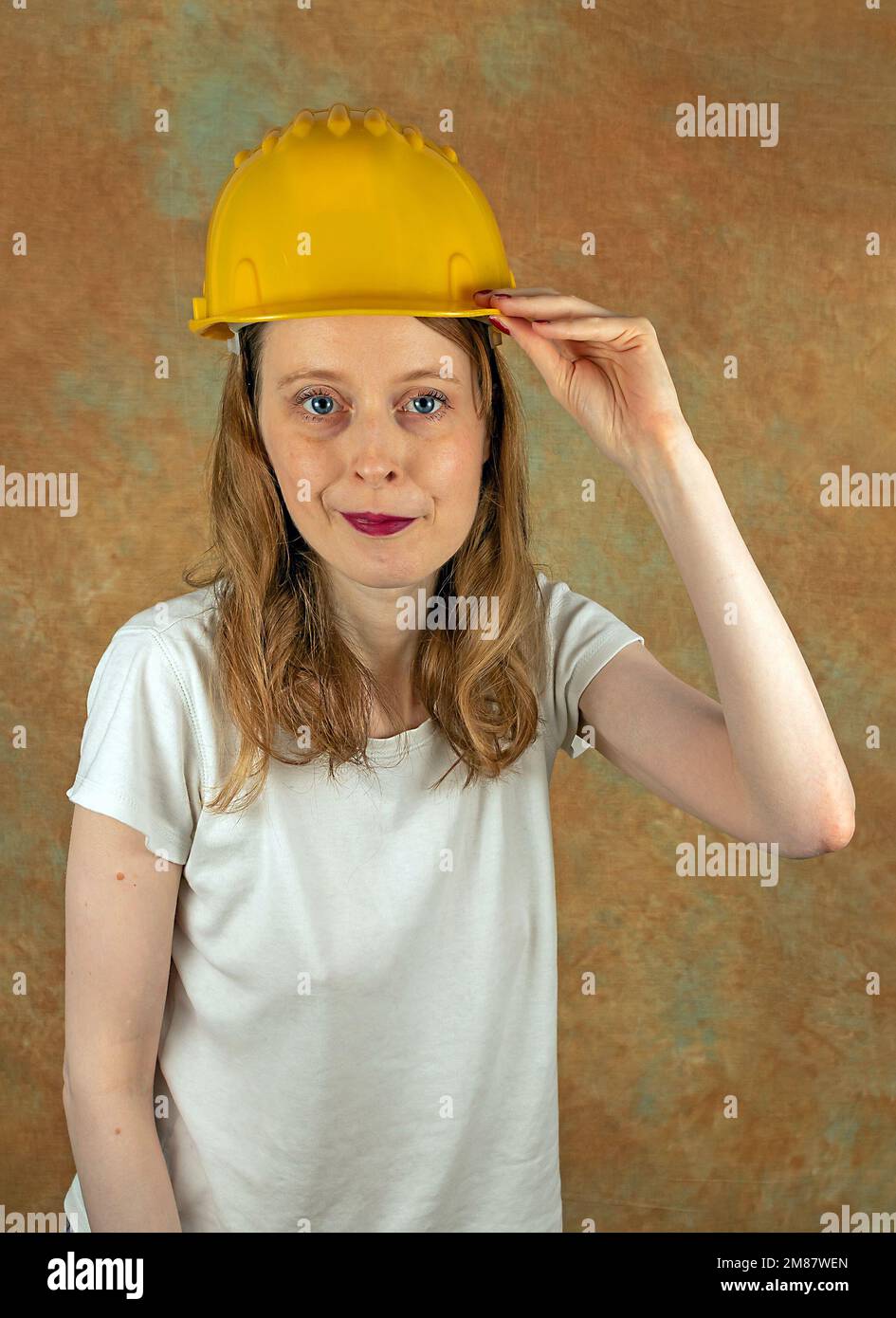 Wearing a protective helmet hi-res stock photography and images - Alamy