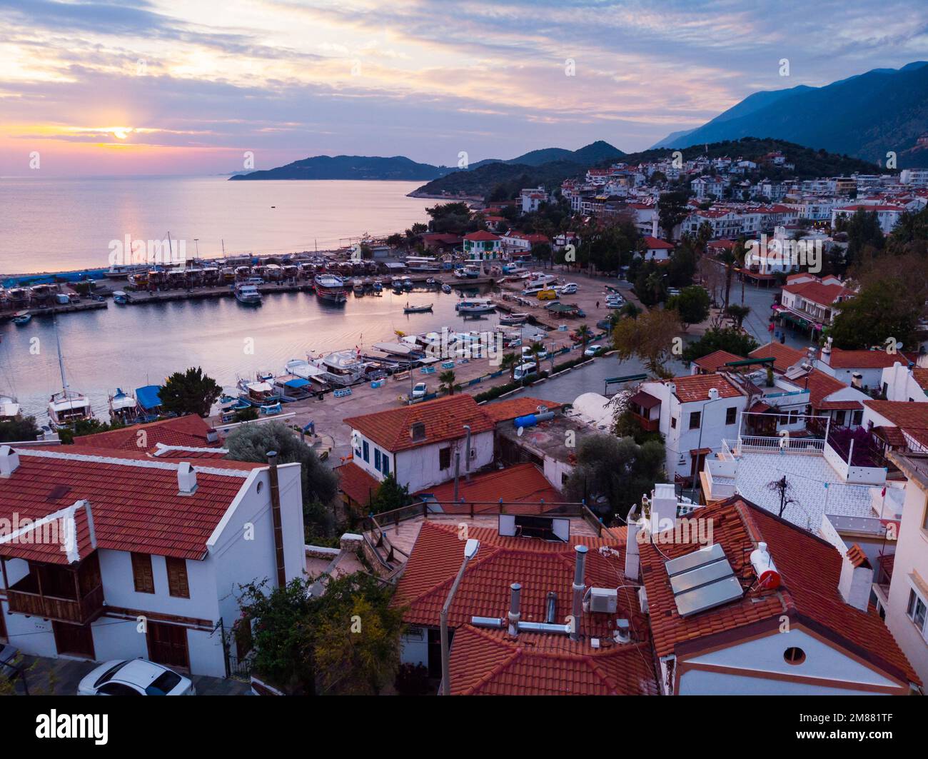 Aerial view of coastal area and marina of Kas during sundown, Turkey Stock Photo