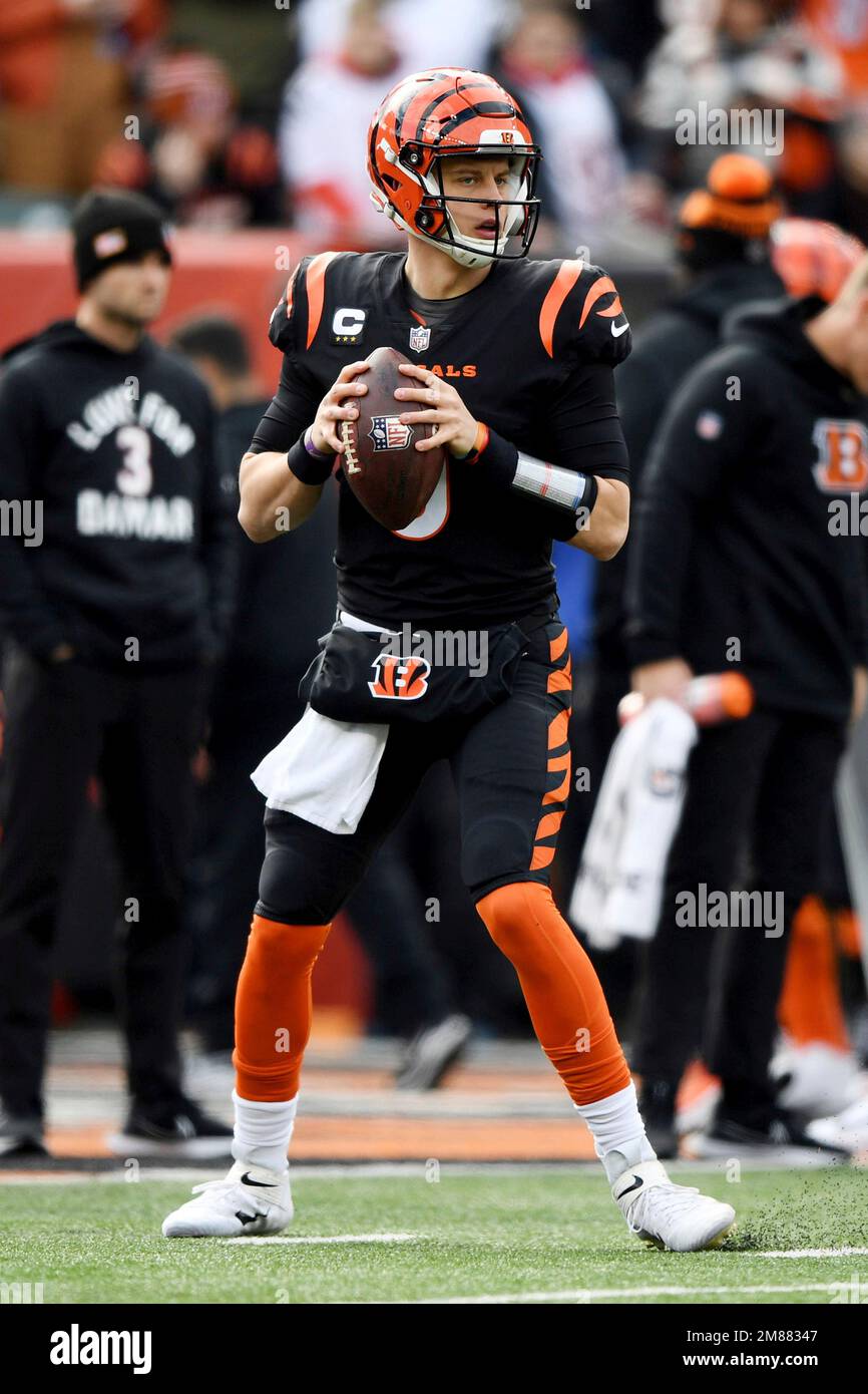 Cincinnati Bengals quarterback Joe Burrow (9) warms up before an NFL
