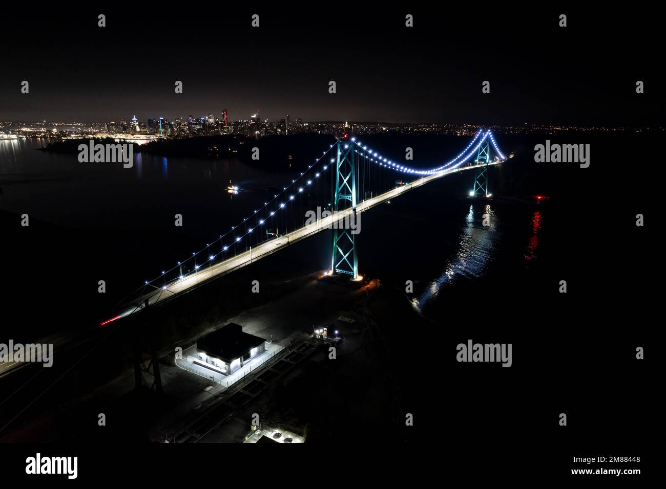 Lions Gate Bridge aerial hyperlapse, night, car light trails, traffic ...