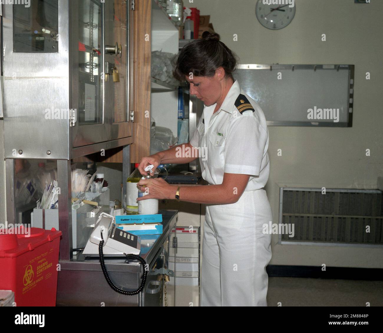 LT. Robin McKenzie, a nurse at the station's hospital, prepares an ...