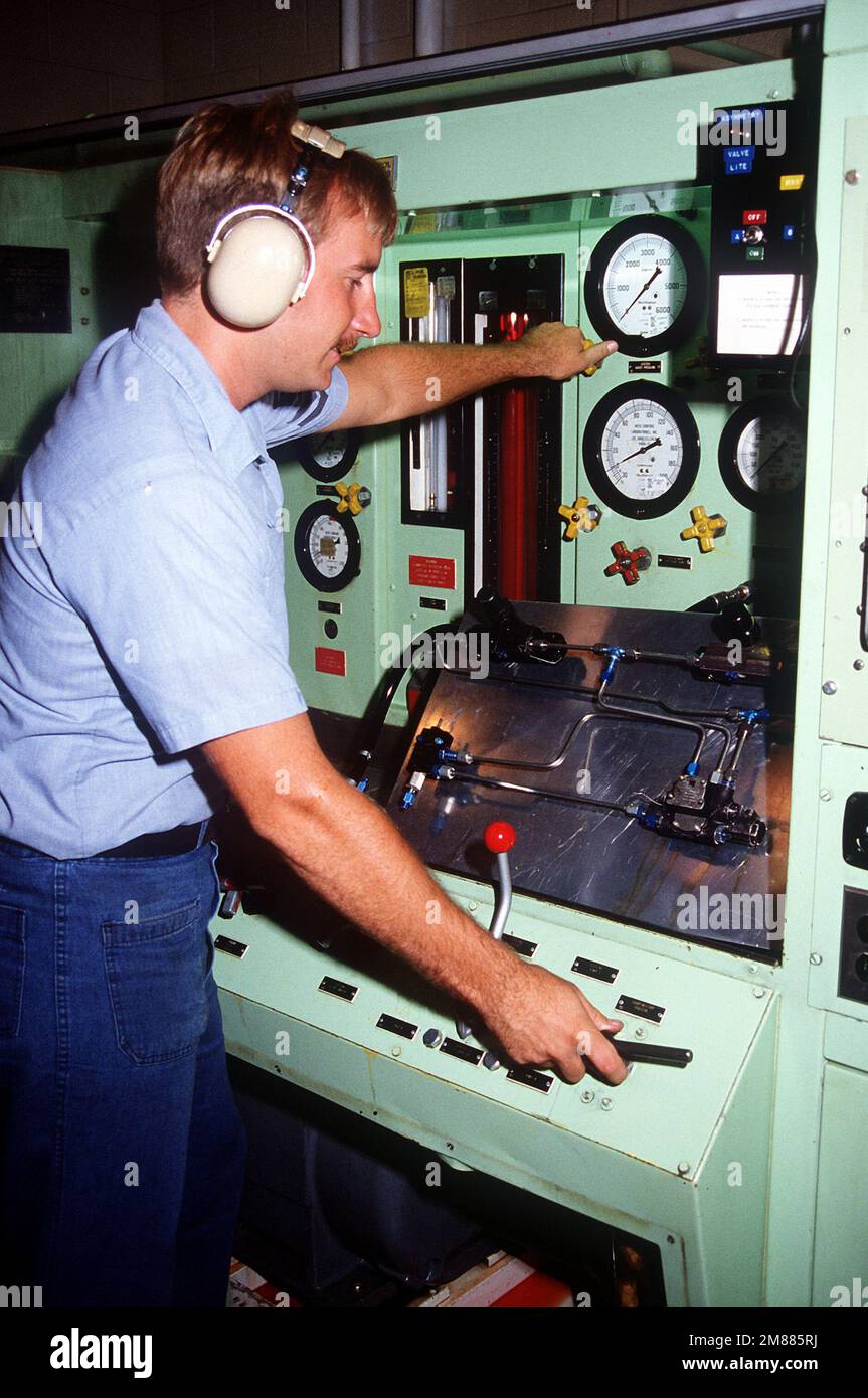 Aviation Structual Mechanic H (Hydraulics) 2nd Class M. Bridge uses an