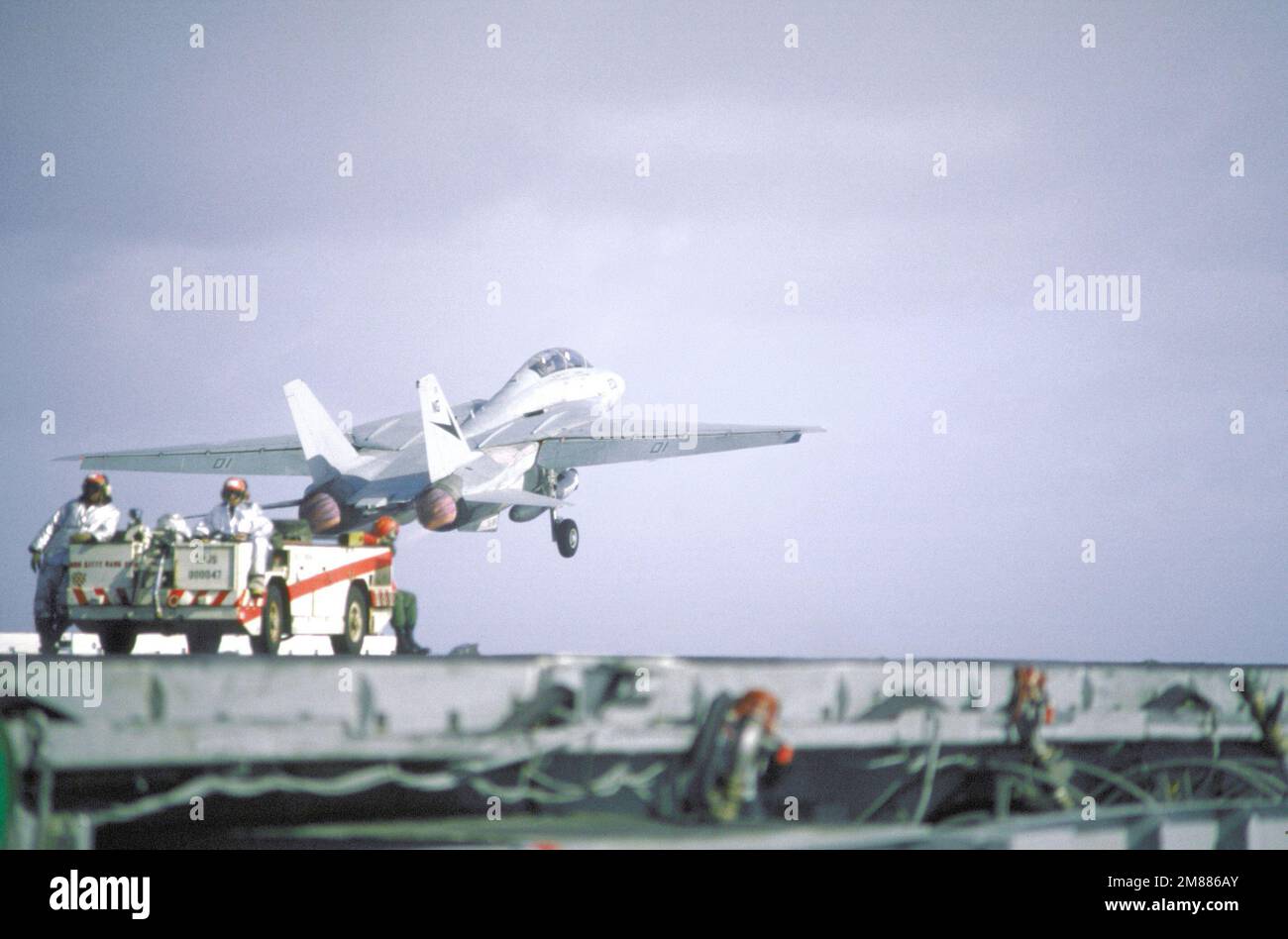 A Fighter Squadron 24 (VF24) F14A Tomcat is launched from the