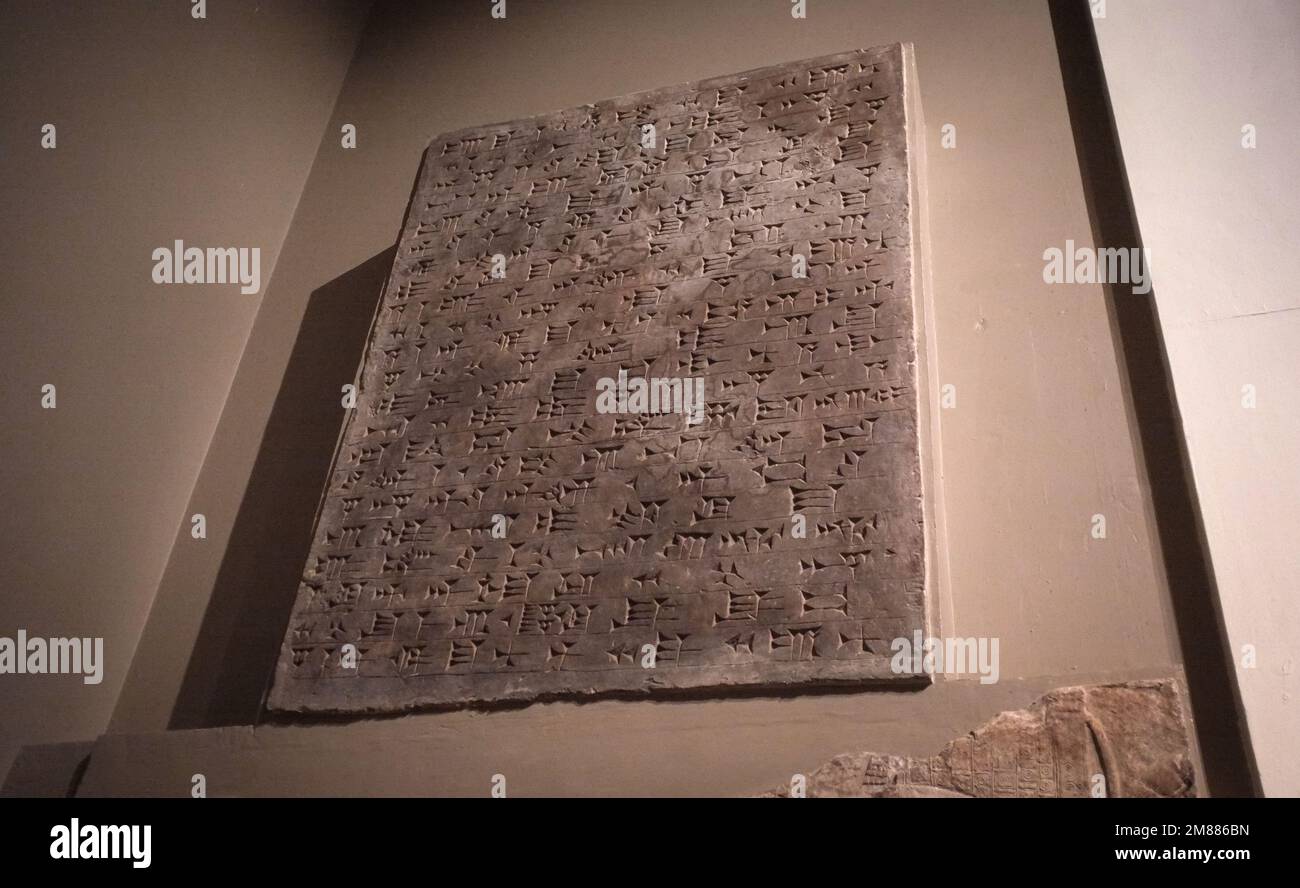 Cuniform writing example from the Sumerian languages at the British Museum, London - cuniform stone tablet Stock Photo