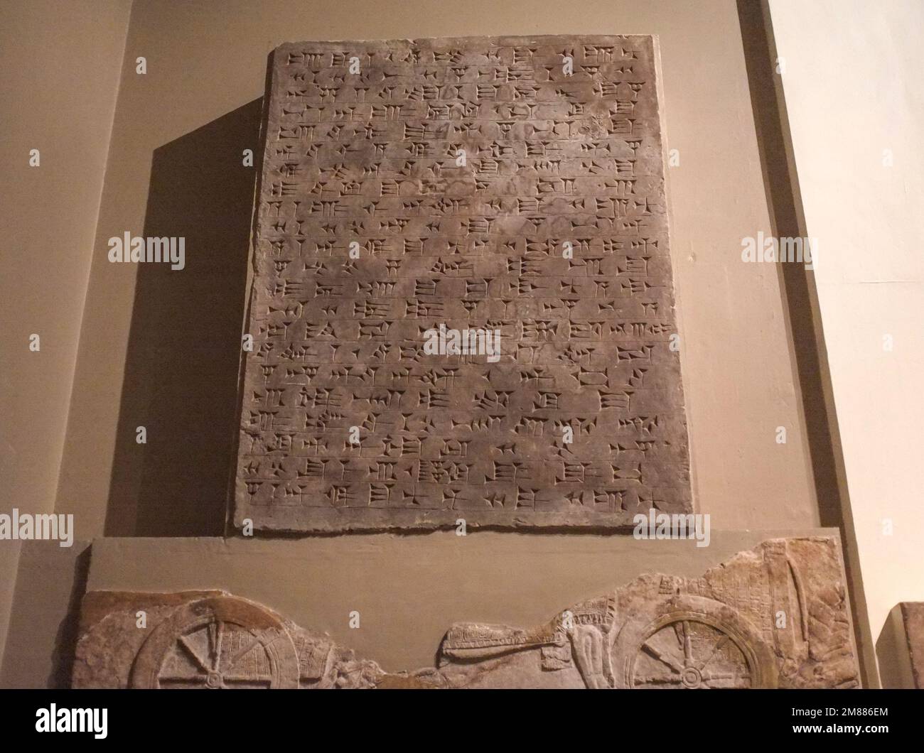 Cuniform writing example from the Sumerian languages at the British Museum, London - cuniform stone tablet Stock Photo